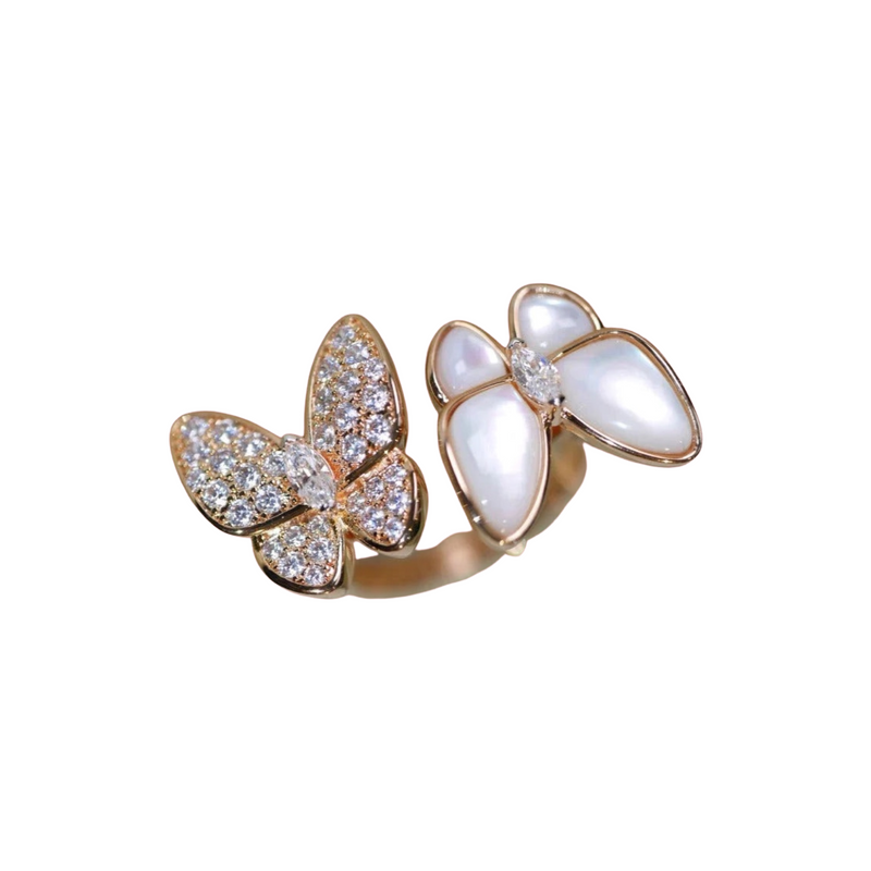 Two Butterfly Between The Finger Ring